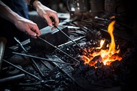 MYSTIC, Conn. -- Civil engineering and naval architecture majors from the U.S. Coast Guard Academy learn basic blacksmithing techniques at the Mystic Seaport Shipsmith Shop April 18, 2016. U.S. Coast Guard photo by Petty Officer 2nd Class Cory J. Mendenhall. Original public domain image from Flickr