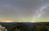 The Milky Way illumines an opalescent night sky over dramatic rock formations near Cape Royal Trail at the North Rim of Grand Canyon National Park. NPS / Jeremy M. White. Original public domain image from Flickr