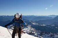 Male climber setting up Belay along Boulder Ridge, Mt Baker Snoqualmie National Forest. Original public domain image from Flickr