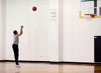 President Barack Obama warms up before playing a basketball game at Fort McNair in Washington, D.C. on Saturday, May 9, 2009.