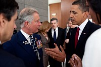 President Barack Obama speaks with Prince Charles prior to the ceremony in Normandy on the 65th anniversary of the D-Day landings, June 6, 2009.