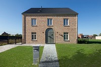 Modern brick house, real estate. Free public domain CC0 photo.