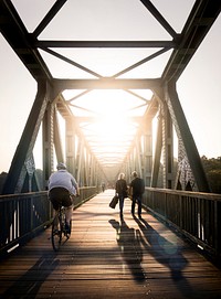 Biker biking trhough the city. Free public domain CC0 photo.