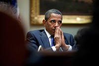 President Barack Obama listens during an economic policy meeting in the Roosevelt Room of the White House, Sept. 11, 2009.