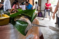 Fried fish served on banana leaf. Free public domain CC0 photo.