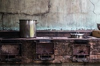 Food preparation in an old kitchen. Free public domain CC0 photo.