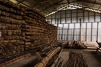 Rattan piles stacked in a barn. Free public domain CC0 image.