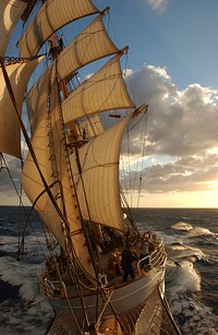 USCGC Eagle(Aug. 25, 2003)--USCGC Eagle sails with a strong wind at sunset as it heads North towards the coast of Maine during the finally leg of the summer cruise. The Eagle is the only operational commissioned sailing vessel in the U.S. maritime services, and is used to train Coast Guard Academy Cadets and Officer Candidates. Original public domain image from Flickr