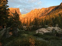 Golden morning in Rocky Mountain NP &ndash; the treasures of this alpine valley are revealed by the rising sun during an early morning hike up to Emerald Lake. Photo by Michelle Verant. Original public domain image from Flickr