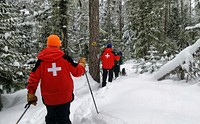 Snow Patrol members help guides figure out what routes to take to make "snow investigations" interesting. Original public domain image from Flickr