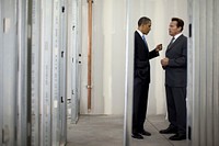 President Barack Obama talks with California Gov. Arnold Schwarzenegger before an event at Solyndra, Inc., in Fremont, Calif., May 26, 2010.