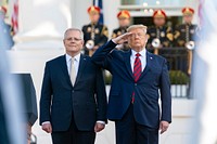 #USAxAUS President Donald J. Trump salutes as he and Australian Prime Minister Scott Morrison review an honor guard parade at the State Visit arrival Friday, Sept. 20, 2019, on the South Lawn of the White House. (Official White House Photo by Shealah Craighead). Original public domain image from Flickr