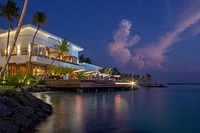 Hotel with terrace on the sea. Free public domain CC0 photo.