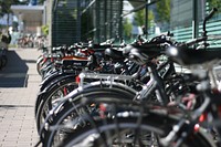 Bicycle parking row near the building. Original public domain image from Flickr 