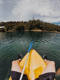 Person kayaking, adventure travel concept. Free public domain CC0 photo.