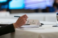 Vice President Kamala Harris takes notes during a virtual Quad Summit with Australia, India, and Japan Friday, March 12, 2021, in the State Dining Room of the White House. (Official White House Photo by Adam Schultz). Original public domain image from Flickr