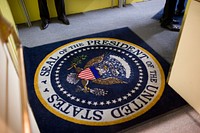 "Another interesting angle by Lawrence Jackson which shows the President's feet, upper right, by a carpet bearing the Presidential seal at a hotel in Washington, D.C."