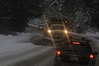 Cars on snowy road. Free public domain CC0 photo.