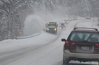 Cars on snowy road. Free public domain CC0 photo.