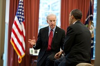 President Barack Obama talks with Vice President Joe Biden in the Oval Office in between meetings to discuss the ongoing budget negotiations, April 8, 2011.