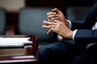 President Barack Obama gestures during a briefing with a bipartisan, bicameral group of members of Congress on the situation in Libya, in the Situation Room of the White House, March 25, 2011.