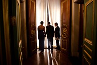 Joe Paulsen, White House Advance Office site lead, holds the curtain for President Barack Obama and First Lady Michelle Obama as they are introduced during the Pritzker Architecture Prize award ceremony at the Andrew Mellon Auditorium in Washington, D.C., June 2, 2011.