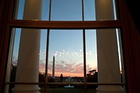 A view of the South Lawn is seen at sunset from the Blue Room of the White House, Jan. 18, 2012.