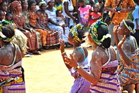 Ghana women dance. Women from Ghana dance at an event to raise community awareness about healthy behaviors. (USAID/Kasia McCormick) 2012. Original public domain image from Flickr