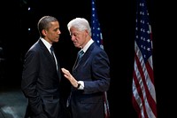 President Barack Obama talks with former President Bill Clinton backstage at the New Amsterdam Theater in New York, N.Y., June 4, 2012.