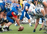 120908-505 Secretary's Cup : NEW LONDON, Conn. -- The U.S. Coast Guard Academy football team faces off against the U.S. Merchant Marine Academy in the Secretary's Cup Sept. 8, 2012. U.S. Coast Guard photo by Petty Officer 3rd Class Cory J. Mendenhall. Original public domain image from Flickr