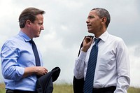 President Barack Obama and Prime Minister David Cameron of the United Kingdom talk during the G8 Summit at the Lough Erne Resort in Enniskillen, Northern Ireland, June 17, 2013.