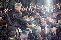 President Clinton, Hillary Rodham Clinton and Chelsea Clinton greet troops at Tuzla Air Force Base in Bosnia