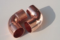 Copper elbow fitting pipes. Free public domain CC0 photo.