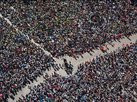 Large outdoor orchestra playing music. Free public domain CC0 photo.