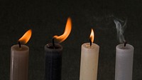 Burning candle in the dark. Free public domain CC0 image.