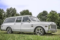 Car parked on the lawn. Free public domain CC0 photo.