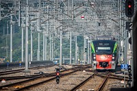 Moving train on a track. Free public domain CC0 photo.