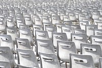 Empty rows of white chairs. Free public domain CC0 photo.