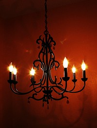 Candelabra lamp hanging from ceiling. Free public domain CC0 photo.