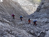 Hikers on mountain. Free public domain CC0 photo.