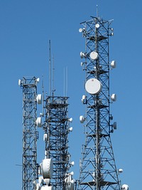 Telecommunications tower with antennas. Free public domain CC0 photo.