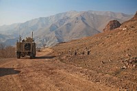 Tank through dirt road. Free public domain CC0 photo.