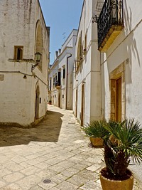 Empty pathway between buildings. Free public domain CC0 image.