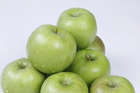 Closeup on pile of green apples. Free public domain CC0 photo.