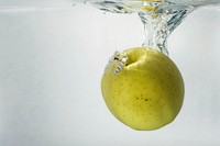 Green apple under water. Free public domain CC0 photo.