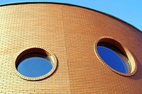 Round brick wall window. Free public domain CC0 photo.