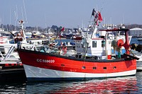 Red electronic fishing boat. Free public domain CC0 photo.