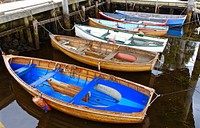 Wooden fishing boats at dock. Free public domain CC0 photo.