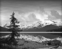 Snowy mountains with lake in black and white. Free public domain CC0 photo.