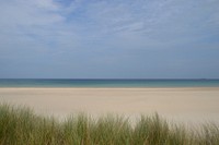 Quiet empty beach scenery. Free public domain CC0 photo.